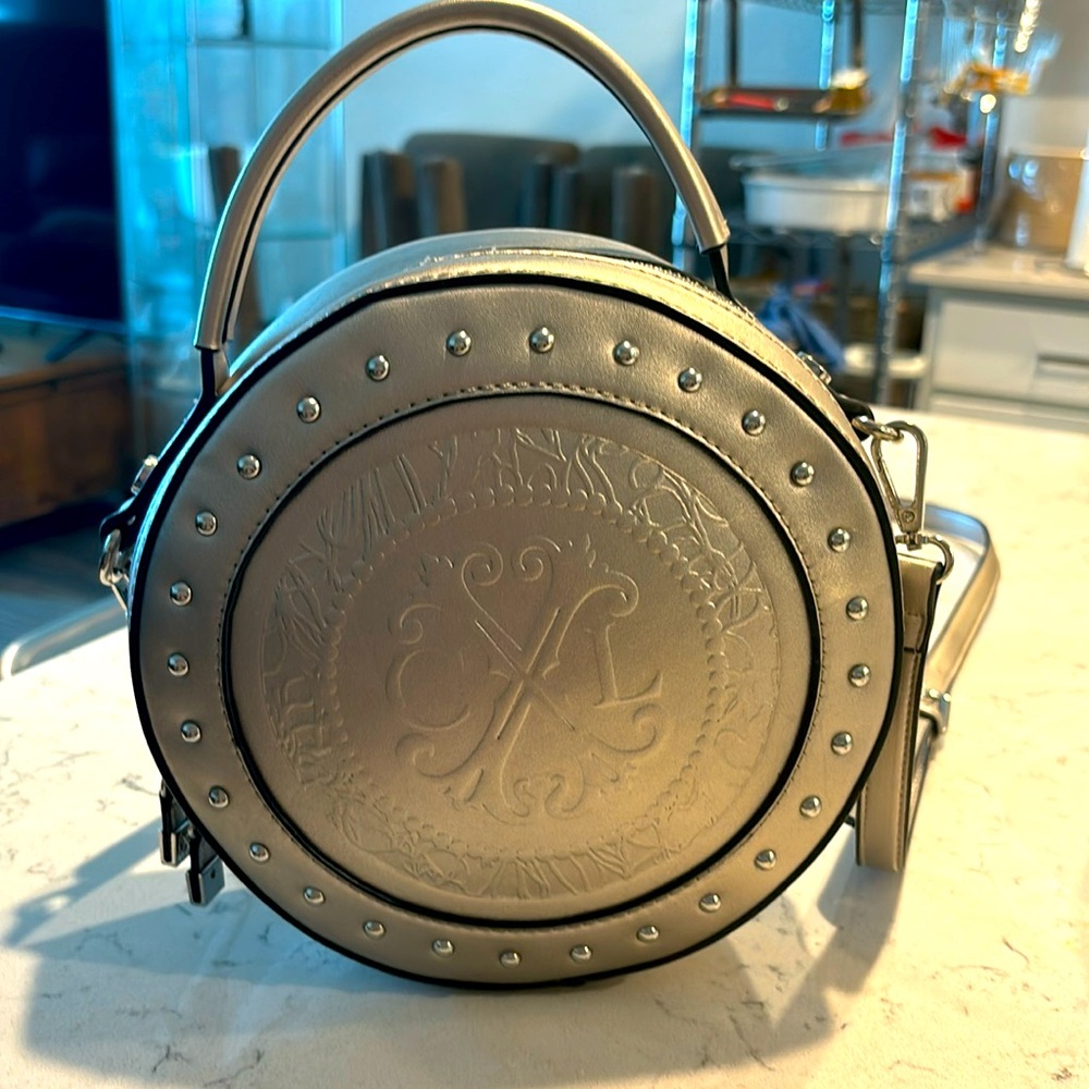Christian Lacroix silver round crossbody bag . EUC silver studs .